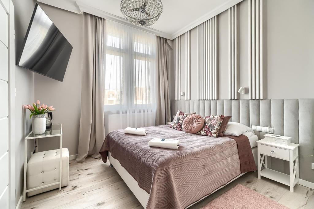 Postel nebo postele na pokoji v ubytování Stawa Villa & Apart