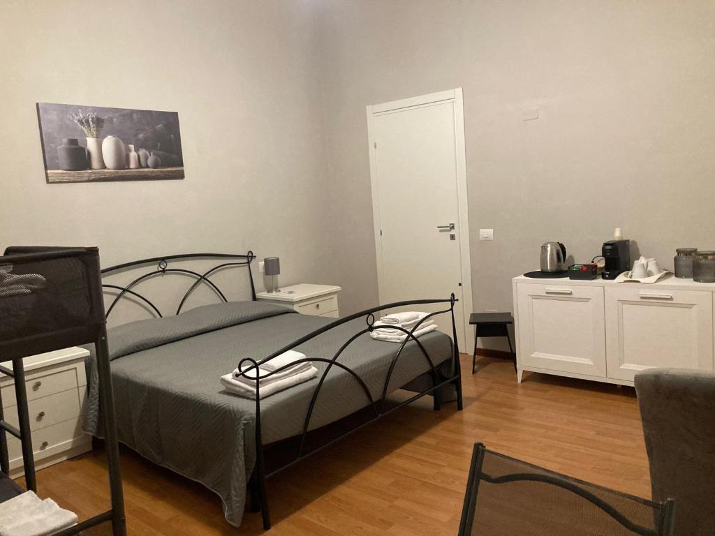 Postel nebo postele na pokoji v ubytování B&B Home XIX