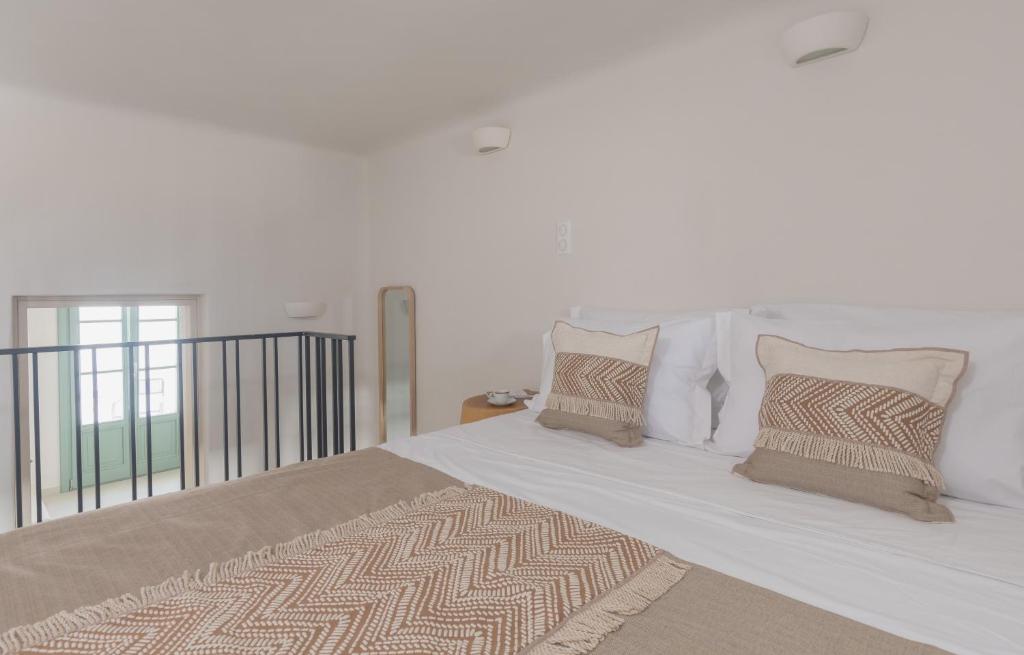 Postel nebo postele na pokoji v ubytování Anestorema House