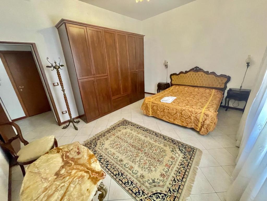 Posteľ alebo postele v izbe v ubytovaní Queen House Venezia