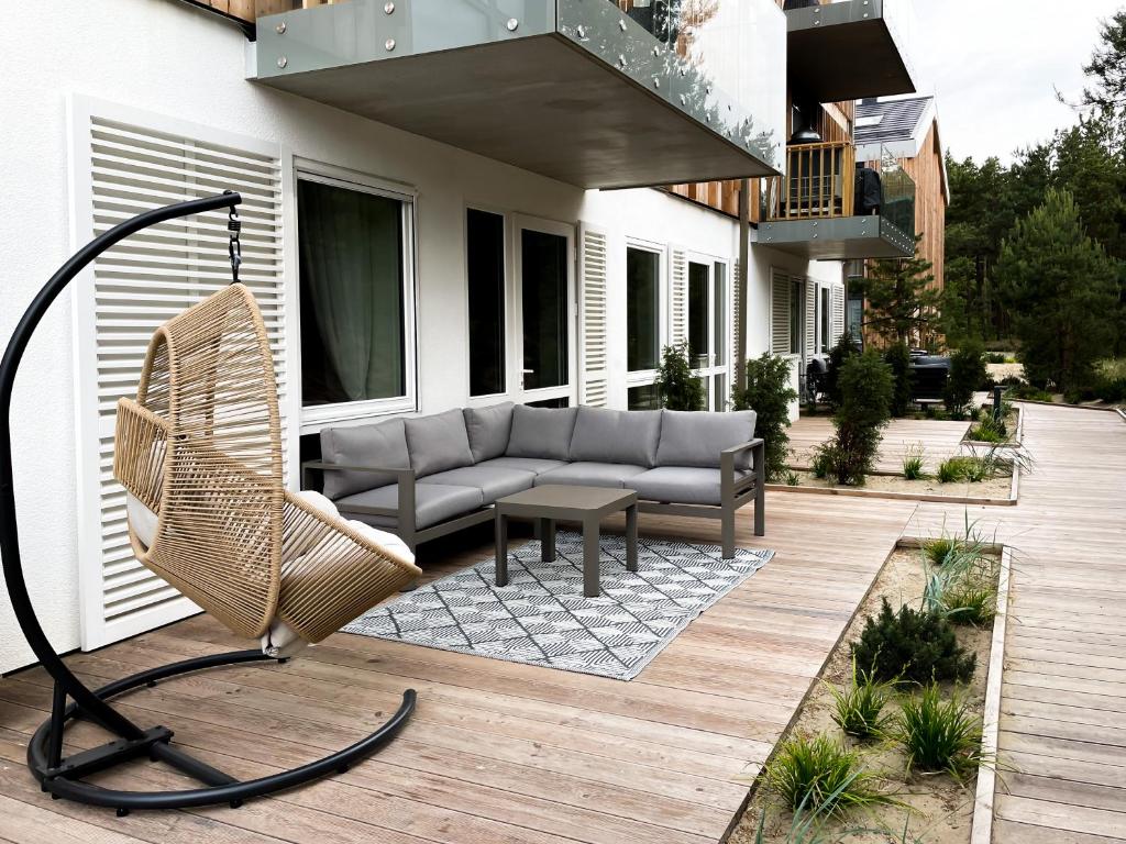 Χώρος καθιστικού στο Pinecone terrace - 2 bedrooms apartment with terrace Nida