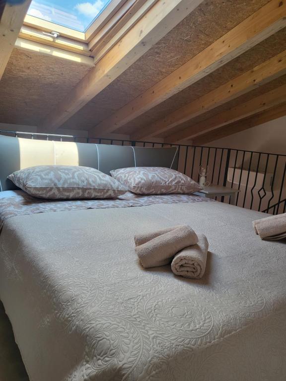 Postel nebo postele na pokoji v ubytování Pjaceta