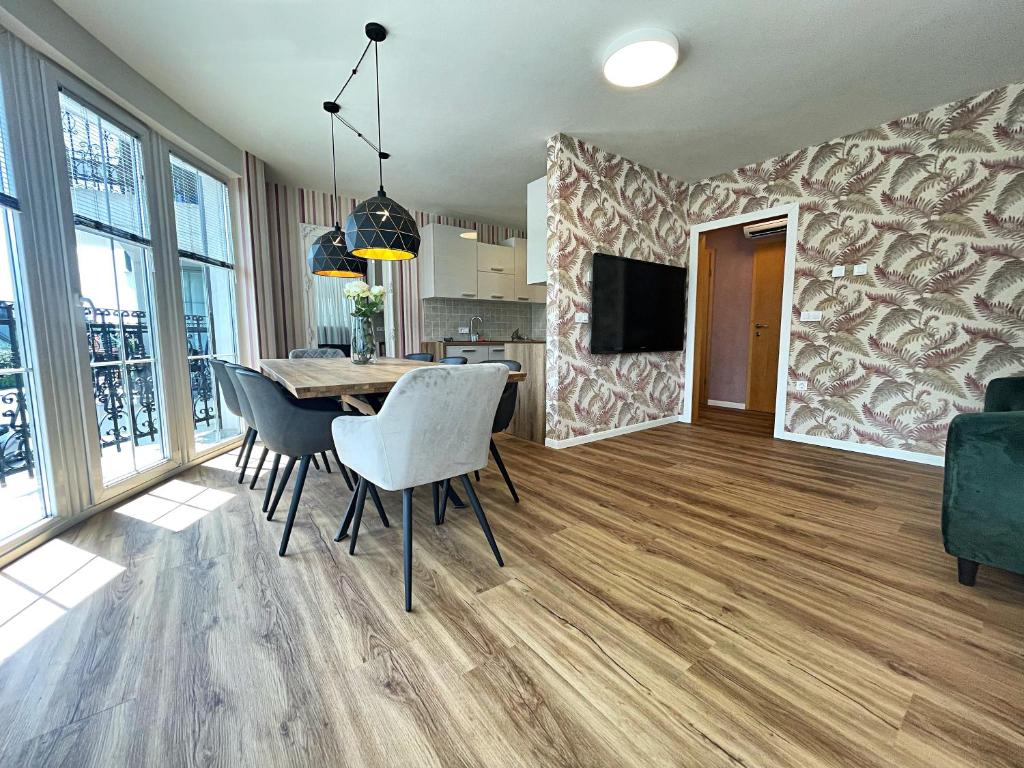 TV a/nebo společenská místnost v ubytování Vila Urbana Luxury Apartments