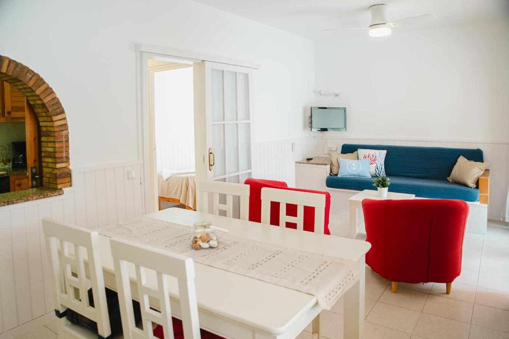 Posedenie v ubytovaní Ideal família a 500m de la playa en SAgaró