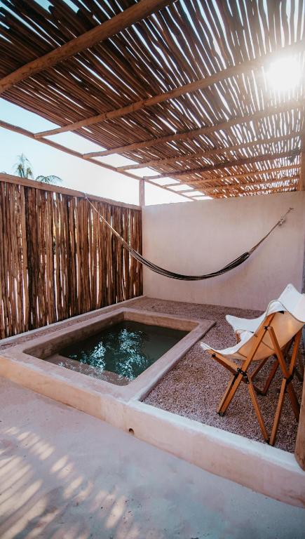 La alberca dentro o cerca de Dos Mares Barefoot Luxury