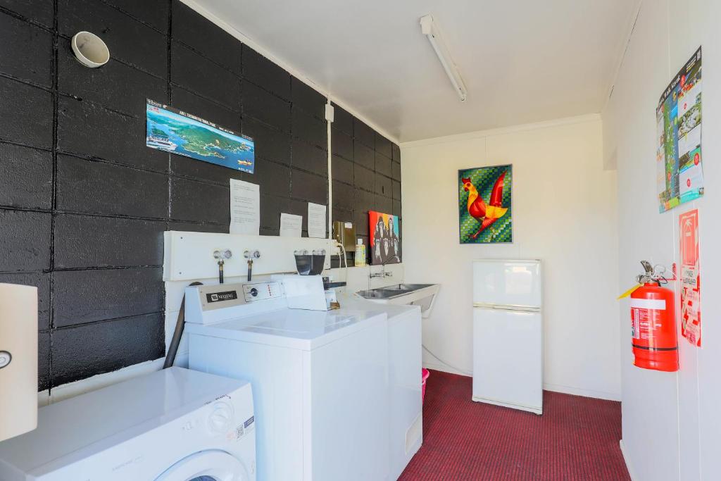 Kuchyň nebo kuchyňský kout v ubytování ASURE Fountain Resort Motel