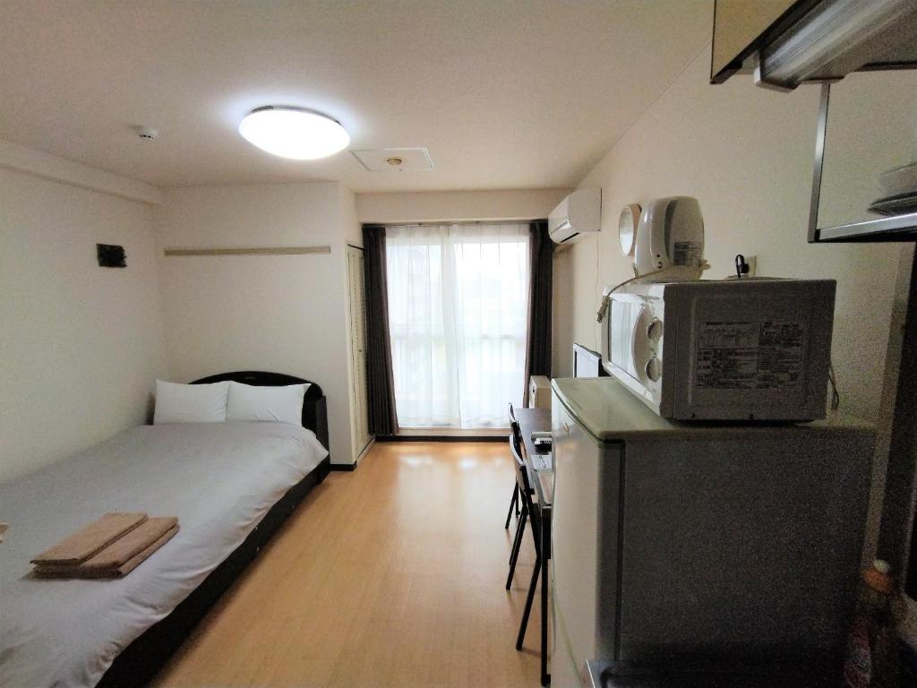 Postel nebo postele na pokoji v ubytování Presant South 8 West 1 / Vacation STAY 5822