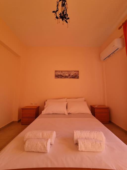 Postel nebo postele na pokoji v ubytování Lux Siviris apartments