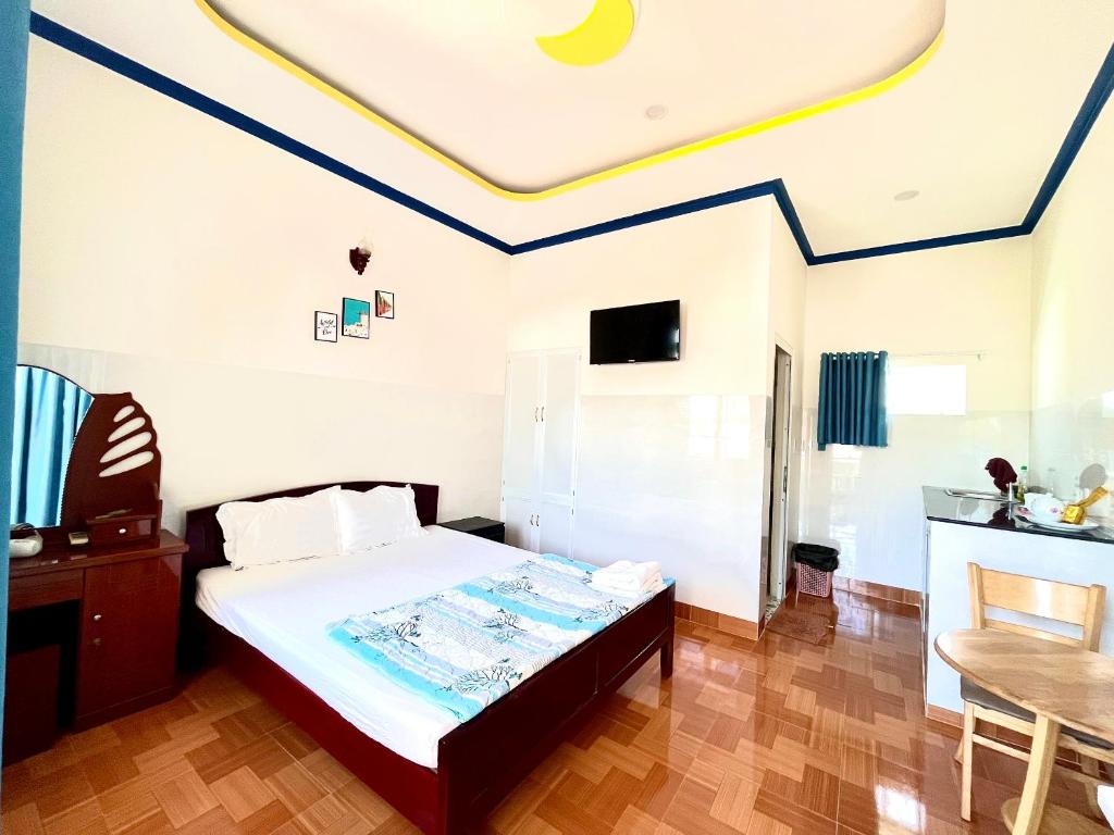 Giường trong phòng chung tại Minh Khoi Guest House
