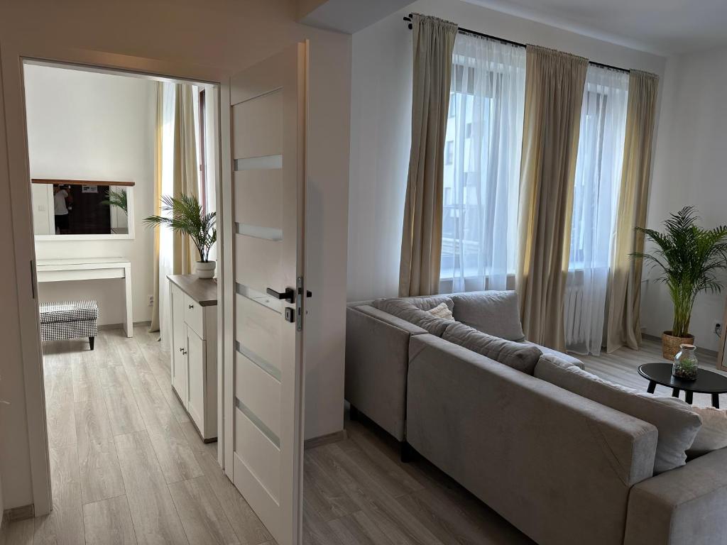 Postel nebo postele na pokoji v ubytování Apartamenty Przy Deptaku