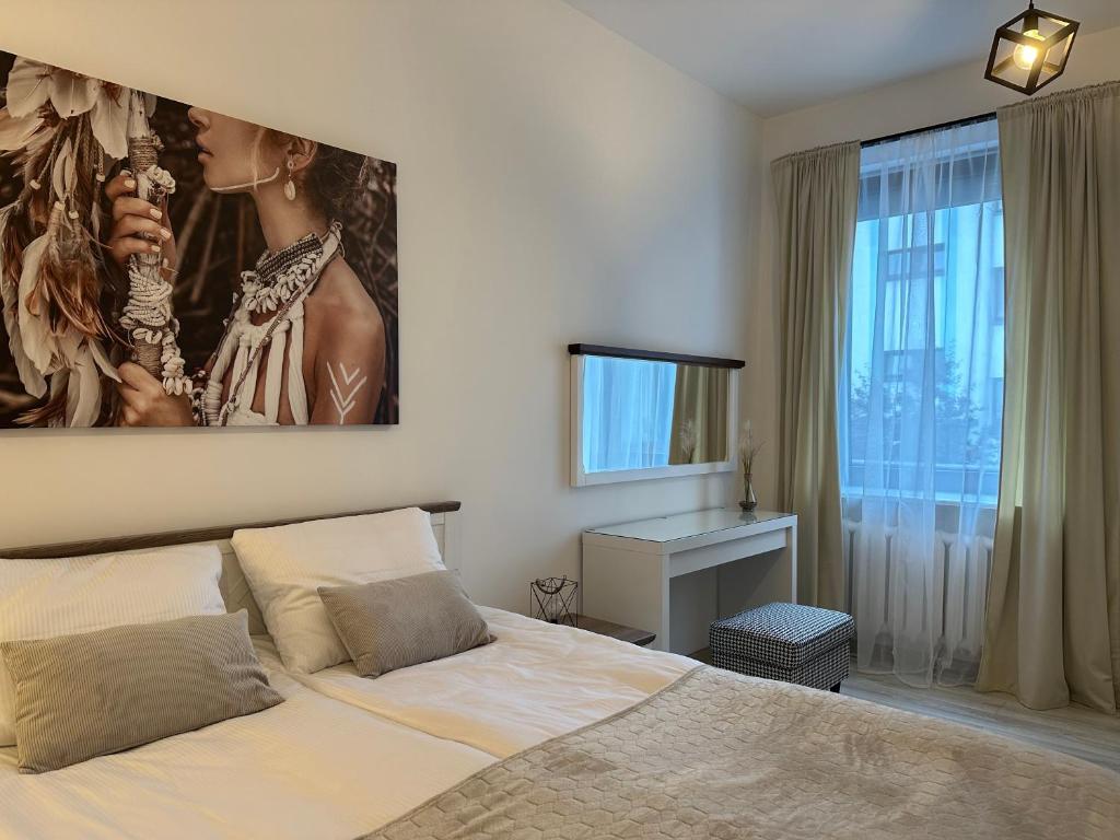Postel nebo postele na pokoji v ubytování Apartamenty Przy Deptaku