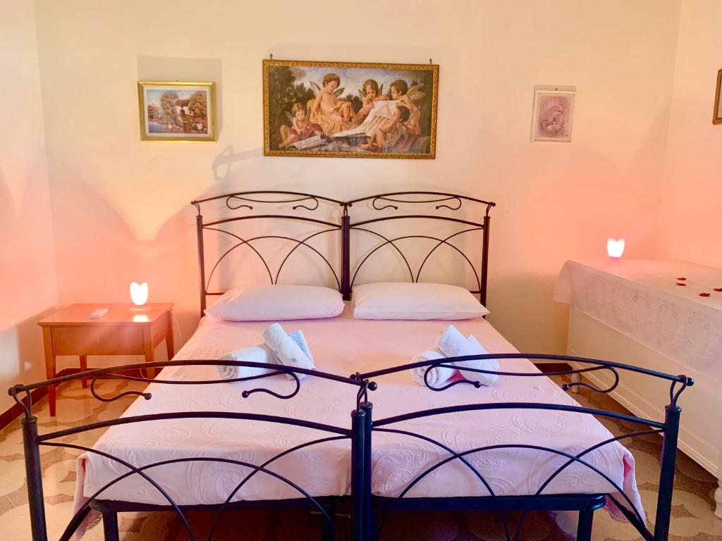 Posteľ alebo postele v izbe v ubytovaní Bed & Breakfast Acquamarina