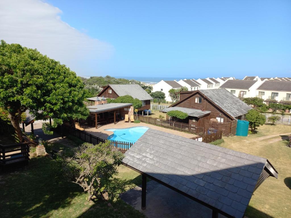 an aerial view of a house with a swimming pool at Little Patch of Heaven in Port Alfred