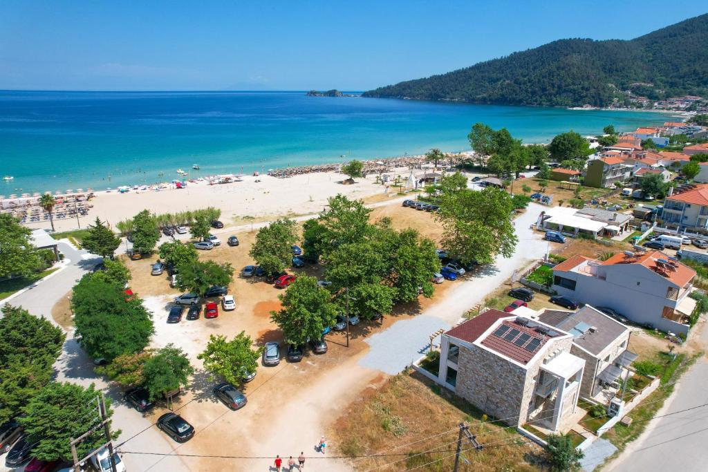 an aerial view of a beach next to the ocean at Brothers Studios & Suites in Skala Potamias