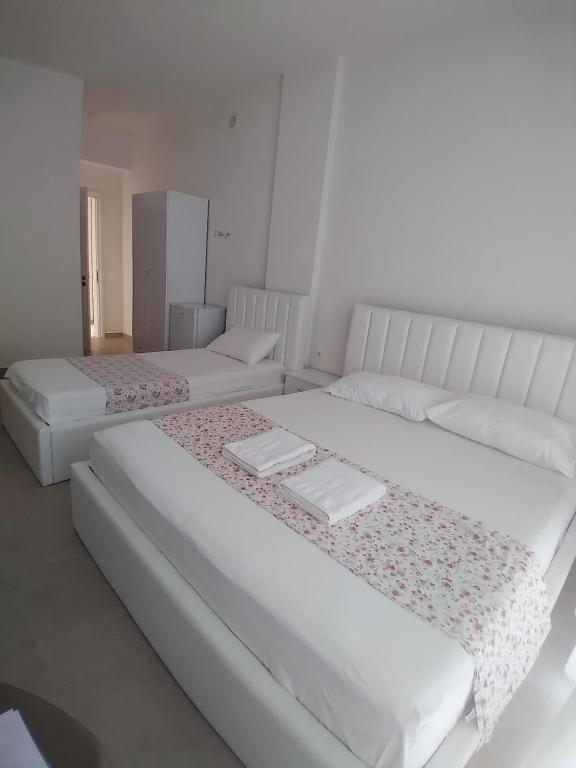 Letto o letti in una camera di Villa Arli&Eris