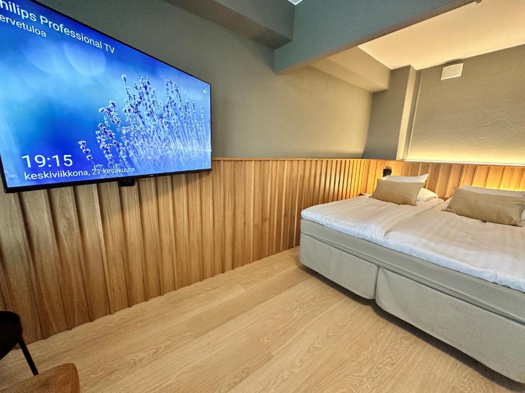 Postel nebo postele na pokoji v ubytování Park Hotel Tornio