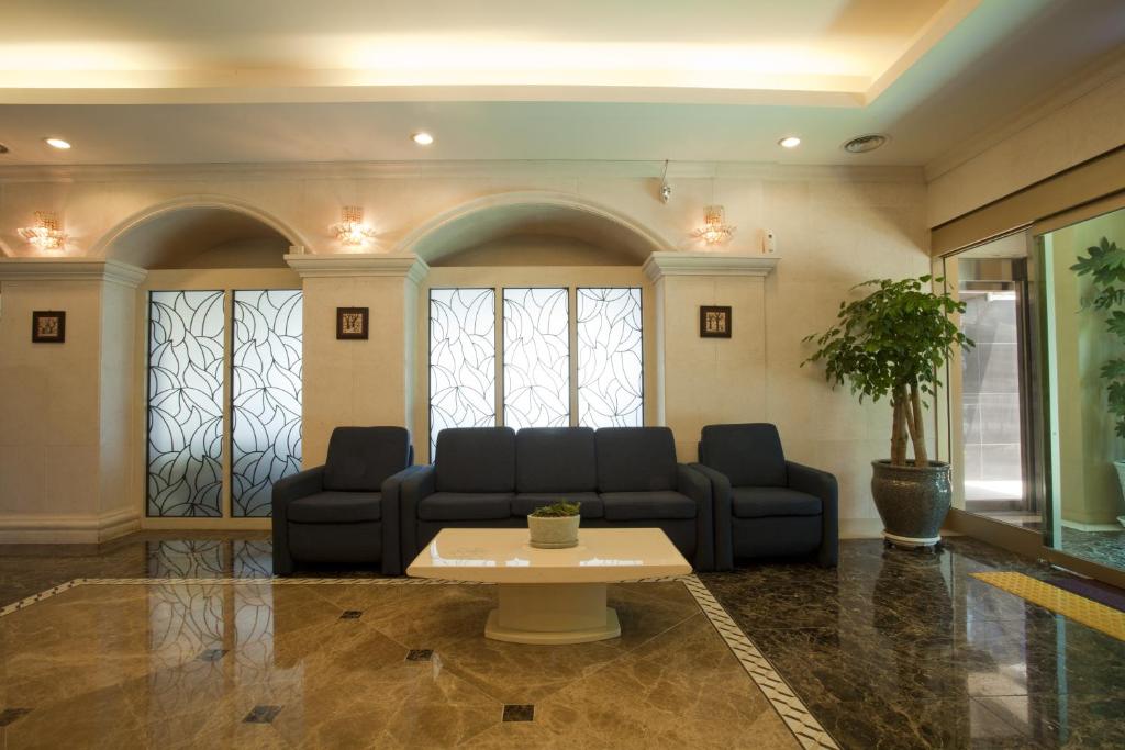 Posezení v ubytování Elin Hotel