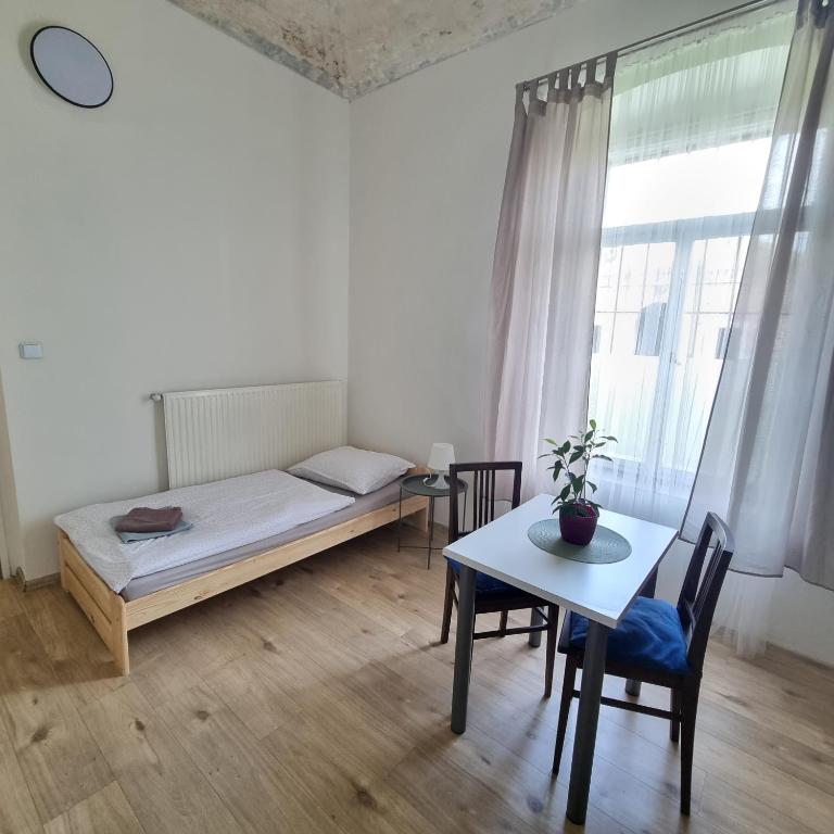 Postel nebo postele na pokoji v ubytování Apartment Porta