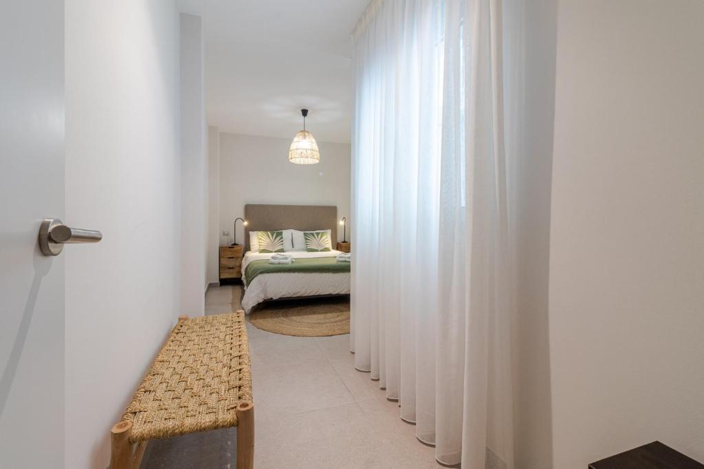 Posteľ alebo postele v izbe v ubytovaní Apartamento Chacolina Las Canteras