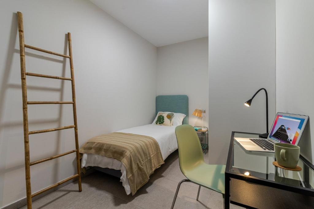Posteľ alebo postele v izbe v ubytovaní Apartamento Chacolina Las Canteras