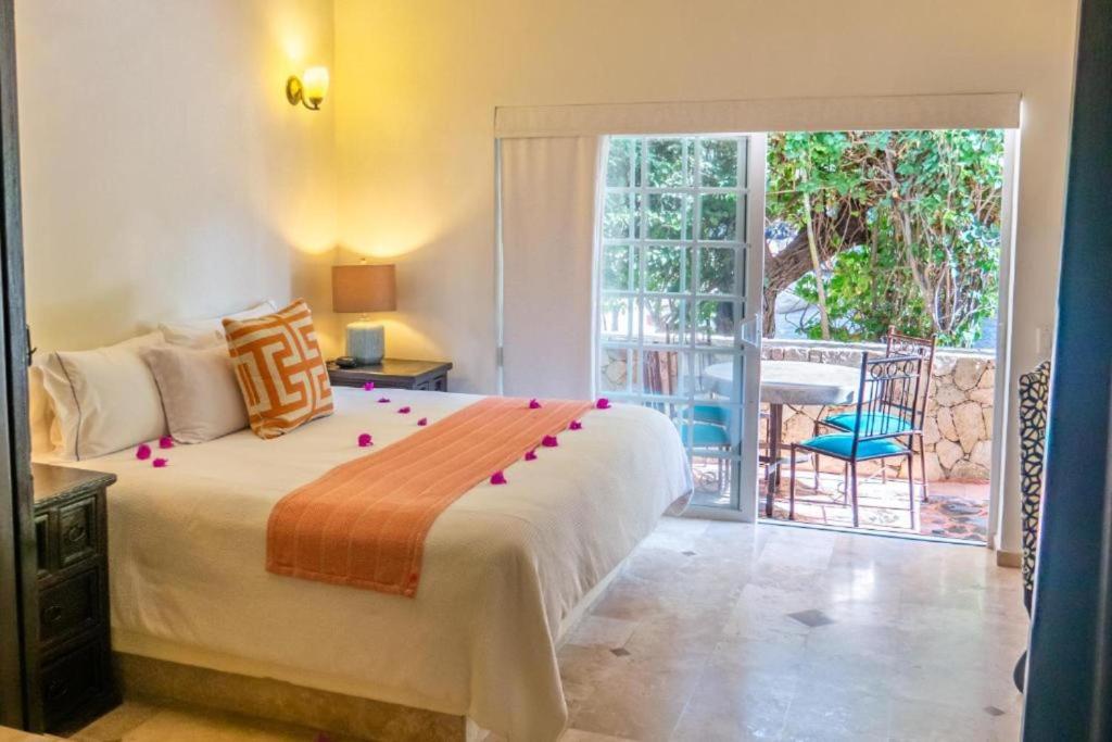 Säng eller sängar i ett rum på Golf Resort in Los Cabos