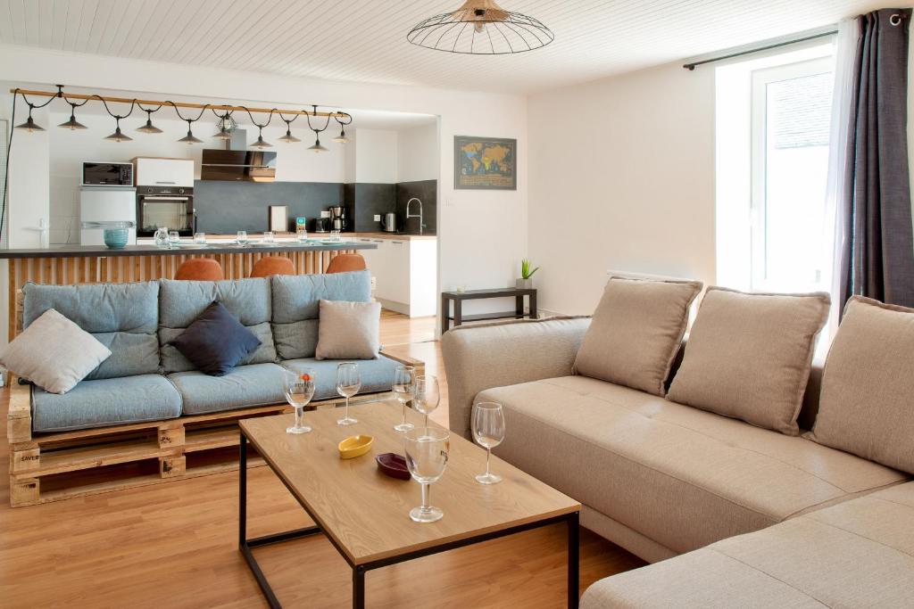 Posezení v ubytování À 100m du port de Loctudy, bel appartement pour 6
