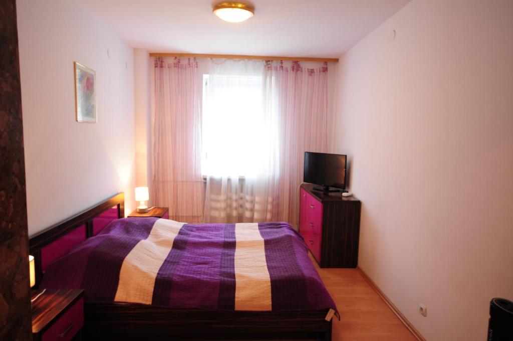 Posteľ alebo postele v izbe v ubytovaní Hotel Wysoka Brama