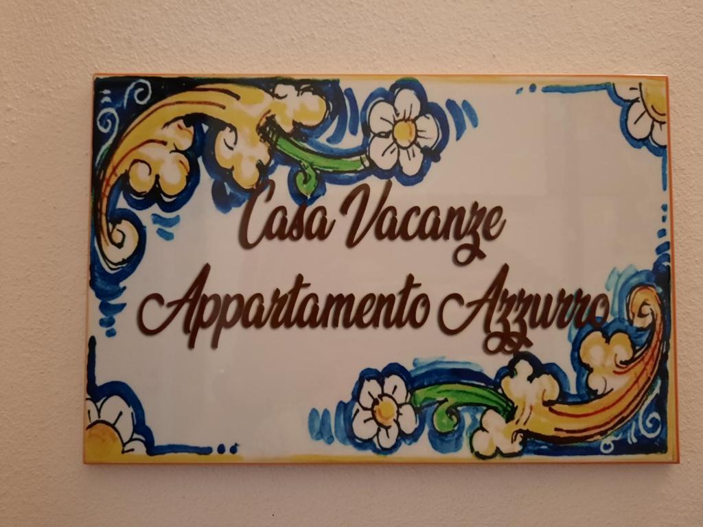 Un cartello che dice la jona jona argentinas argentoentoento di Appartamento Azzurro a Torre Grande