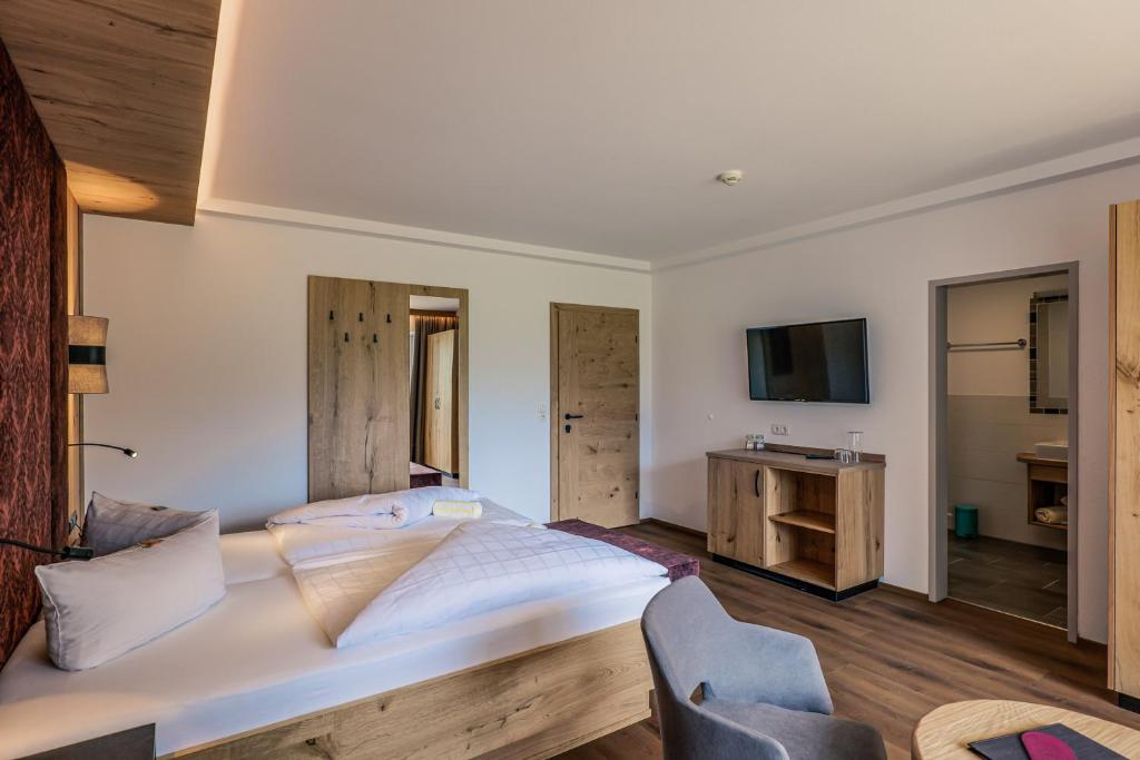 TV a/nebo společenská místnost v ubytování Hotel Föhrenhof