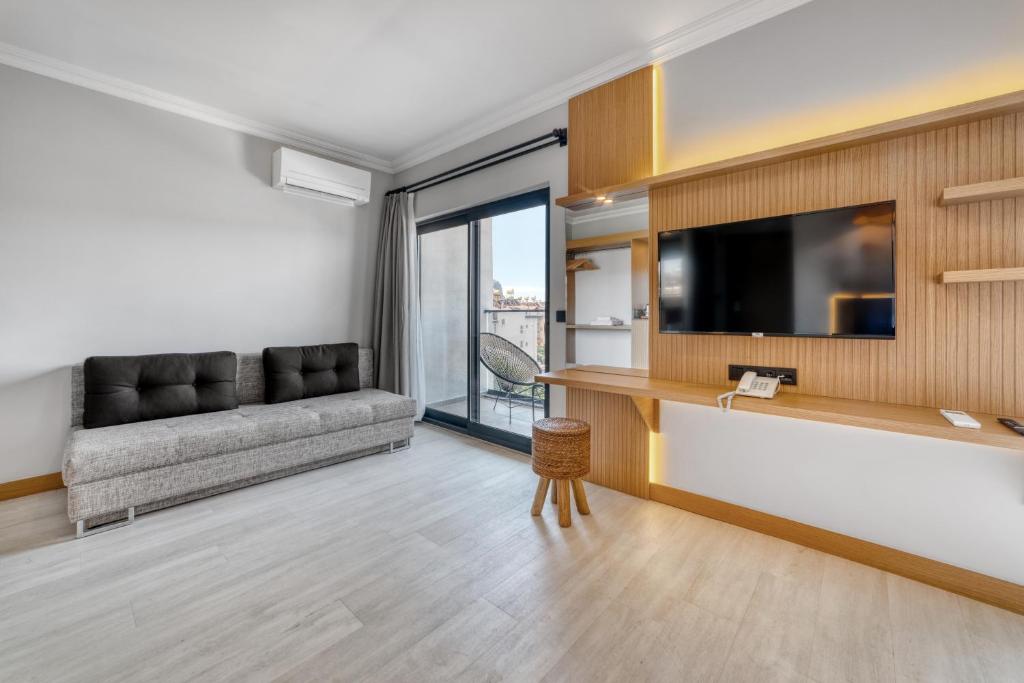 TV a/nebo společenská místnost v ubytování Hildegard Hotel
