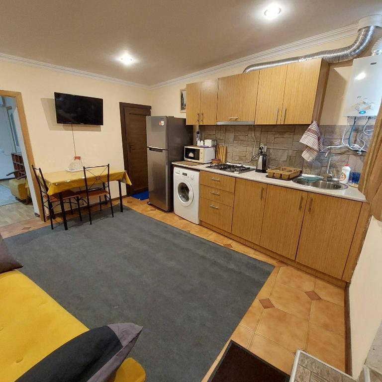 Kuchyň nebo kuchyňský kout v ubytování Buddha apartment