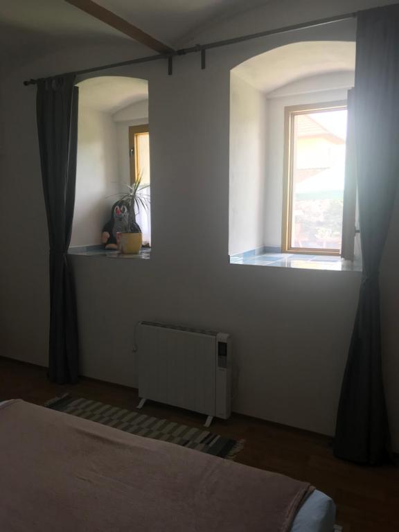 Postel nebo postele na pokoji v ubytování Penzion u Formana