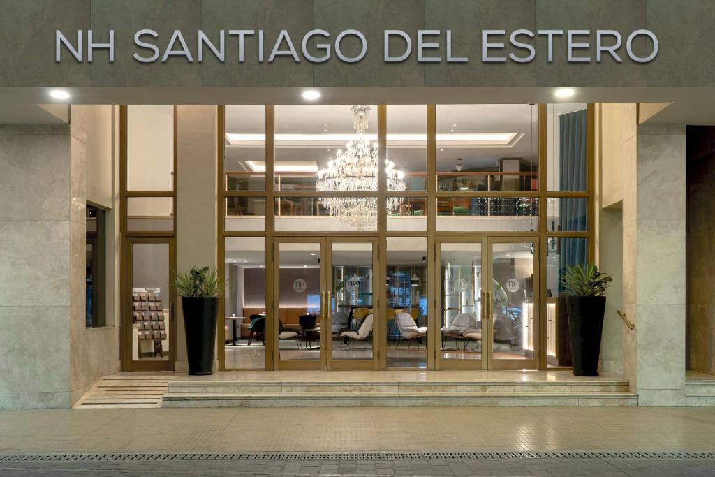 a building with a sign that reads nir sanriento del estro at NH Santiago del Estero in Santiago del Estero