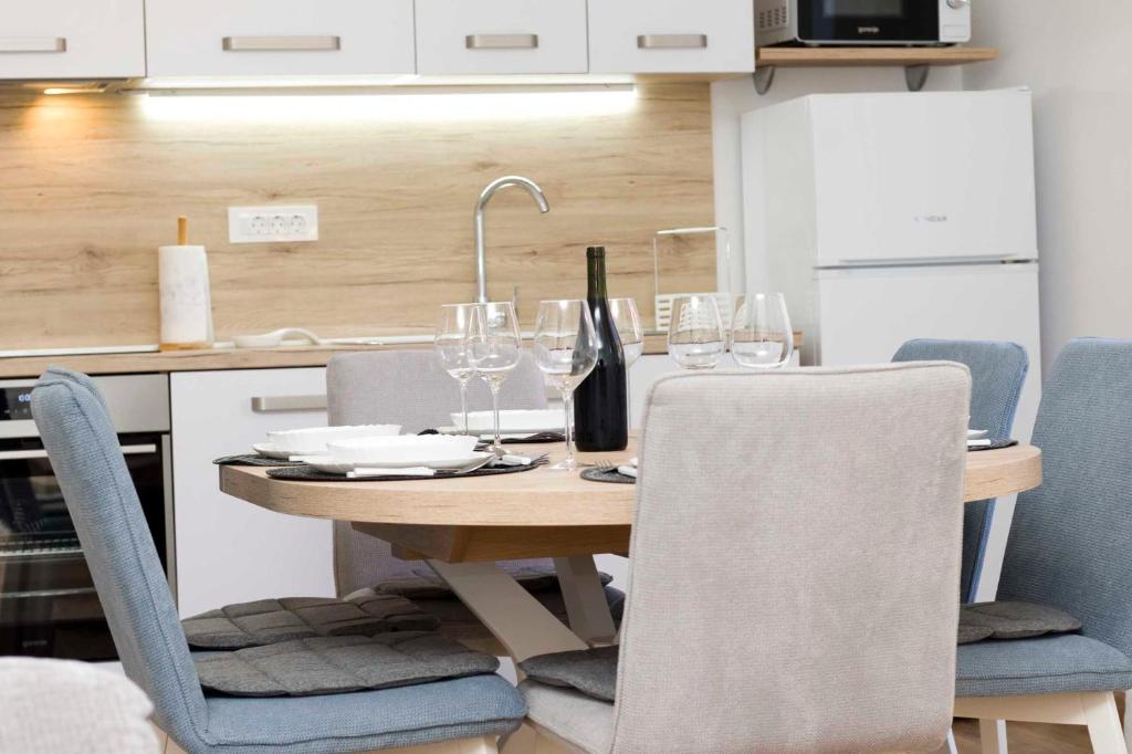 Kuchyň nebo kuchyňský kout v ubytování Apartment Navis