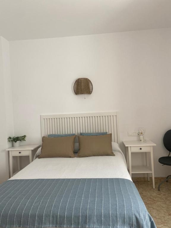 Postel nebo postele na pokoji v ubytování Hostal Andalucia