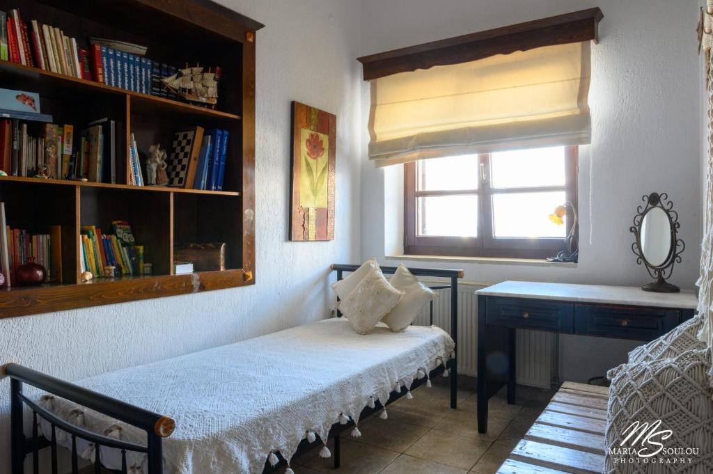 Postel nebo postele na pokoji v ubytování Siridaki Homes Leros