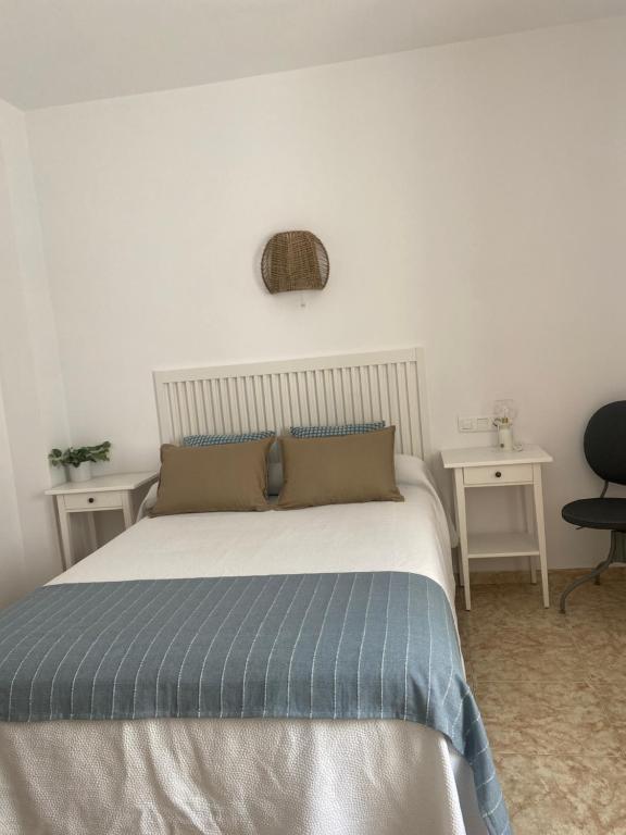 Postel nebo postele na pokoji v ubytování Hostal Andalucia
