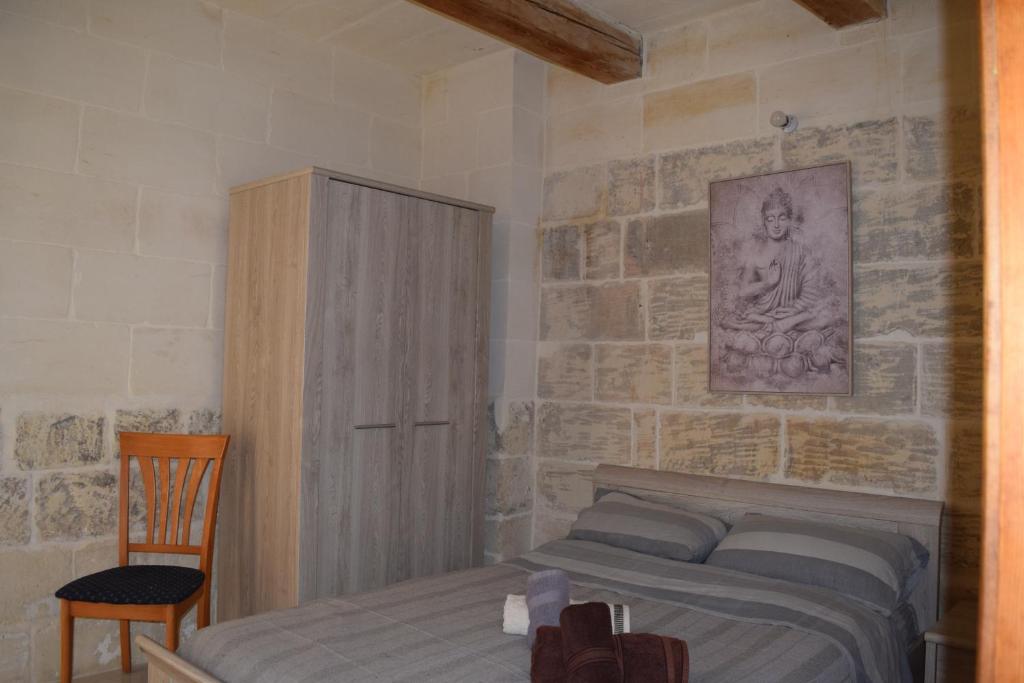 Postel nebo postele na pokoji v ubytování St George of Lydda B&B