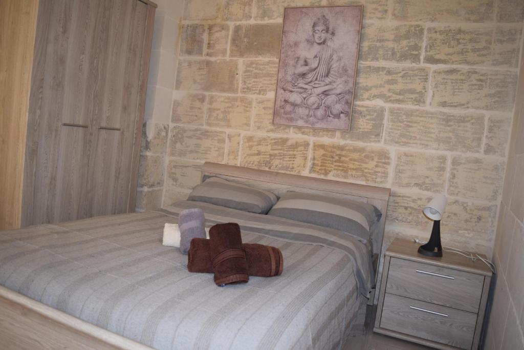 Postel nebo postele na pokoji v ubytování St George of Lydda B&B