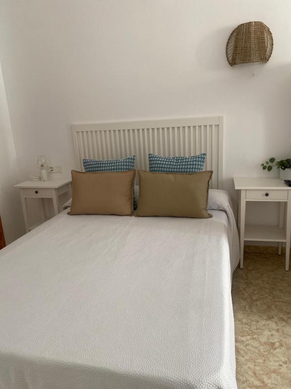 Postel nebo postele na pokoji v ubytování Hostal Andalucia