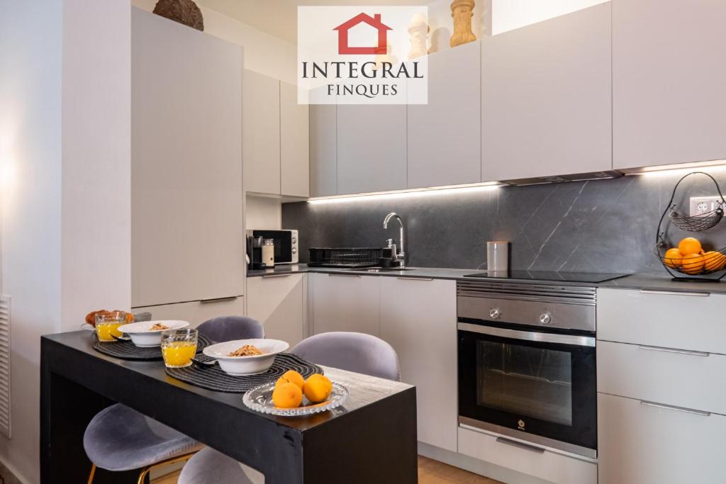 Kuchyňa alebo kuchynka v ubytovaní Apartaments Ca la Somiada