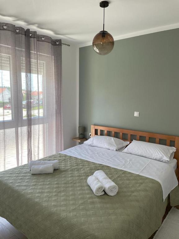 Postel nebo postele na pokoji v ubytování Apartman Stela