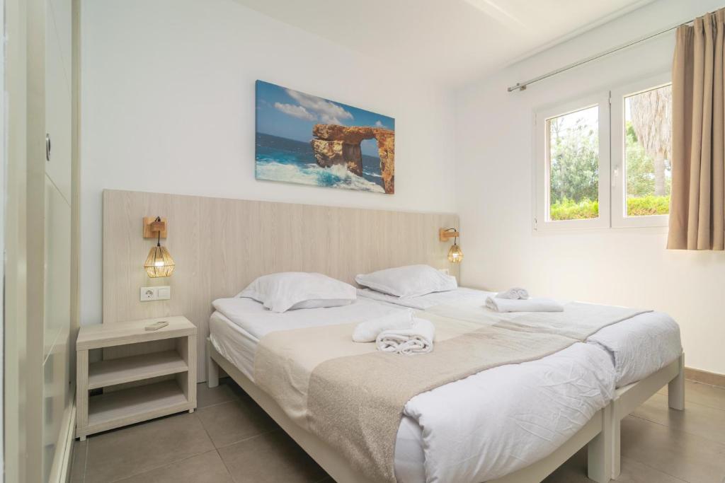 Postel nebo postele na pokoji v ubytování Villa Blanca