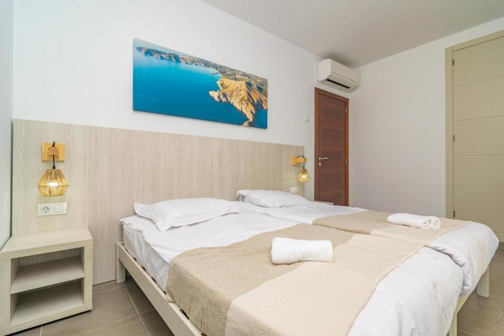Postel nebo postele na pokoji v ubytování Villa Blanca
