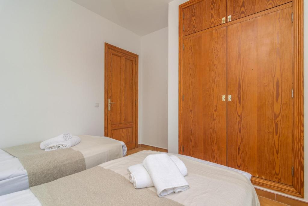 Postel nebo postele na pokoji v ubytování Villa Blanca