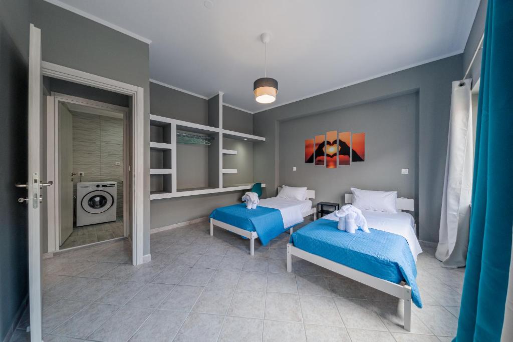 Postel nebo postele na pokoji v ubytování Luxury Sea View Apartment in Kolimvari