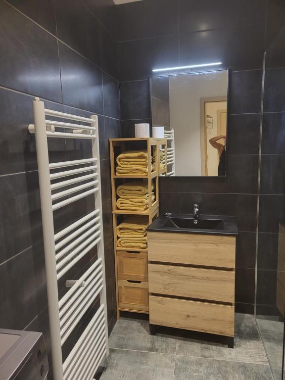 Kuchyň nebo kuchyňský kout v ubytování Duplex neuf 2 chambres HUY