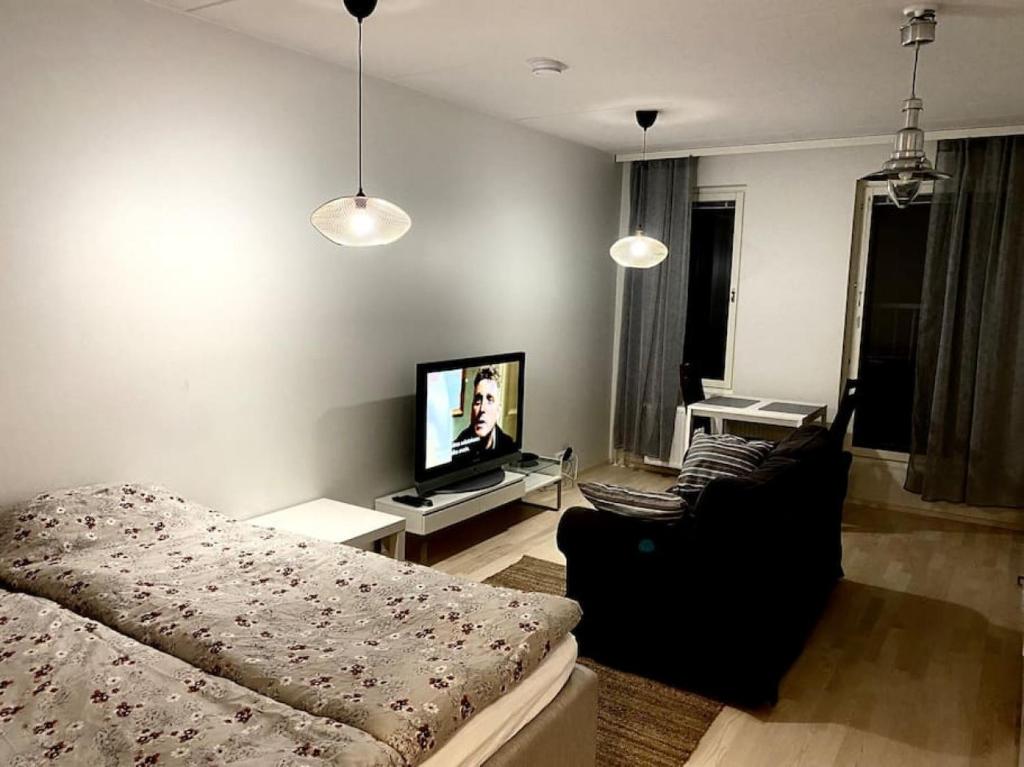 Postel nebo postele na pokoji v ubytování PEURANIITTY-1 New modern apartment