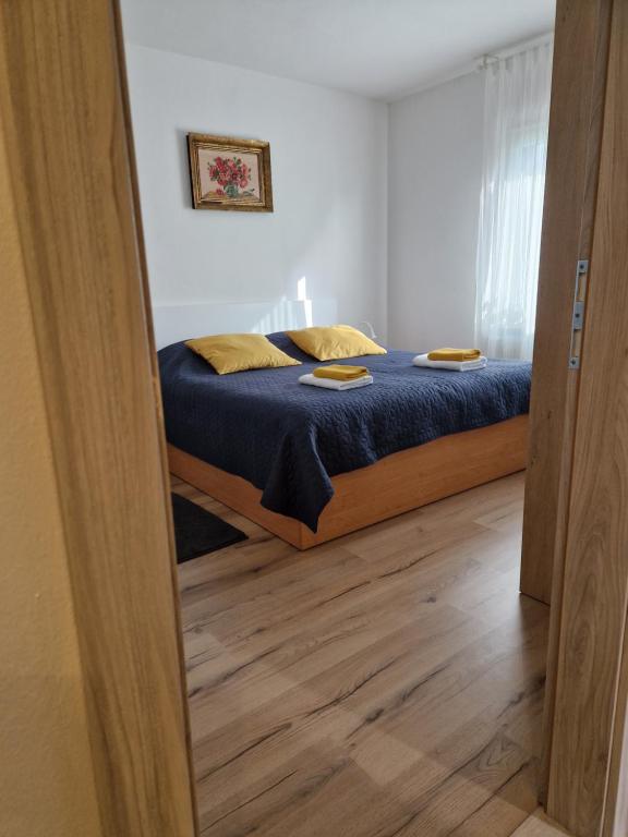 Postel nebo postele na pokoji v ubytování Medeni Apartma