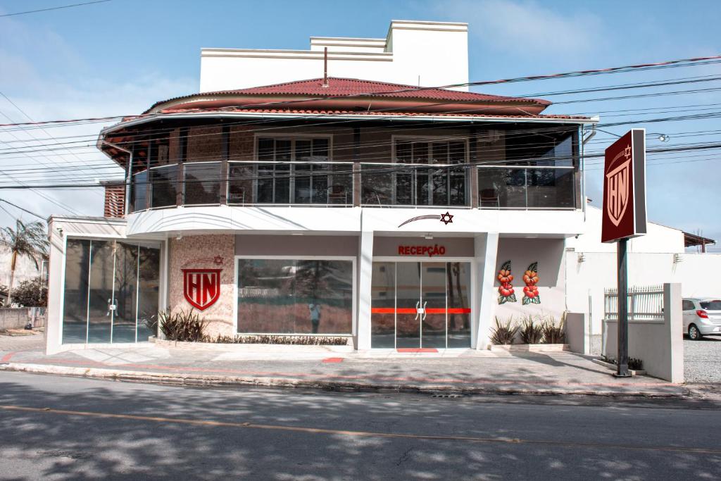 a building on the corner of a street at HN-Hotel Natal Penha in Penha